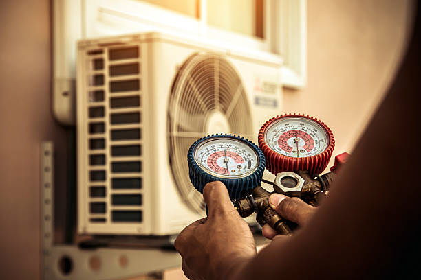 Professional Hvac technician working in Felton, DE